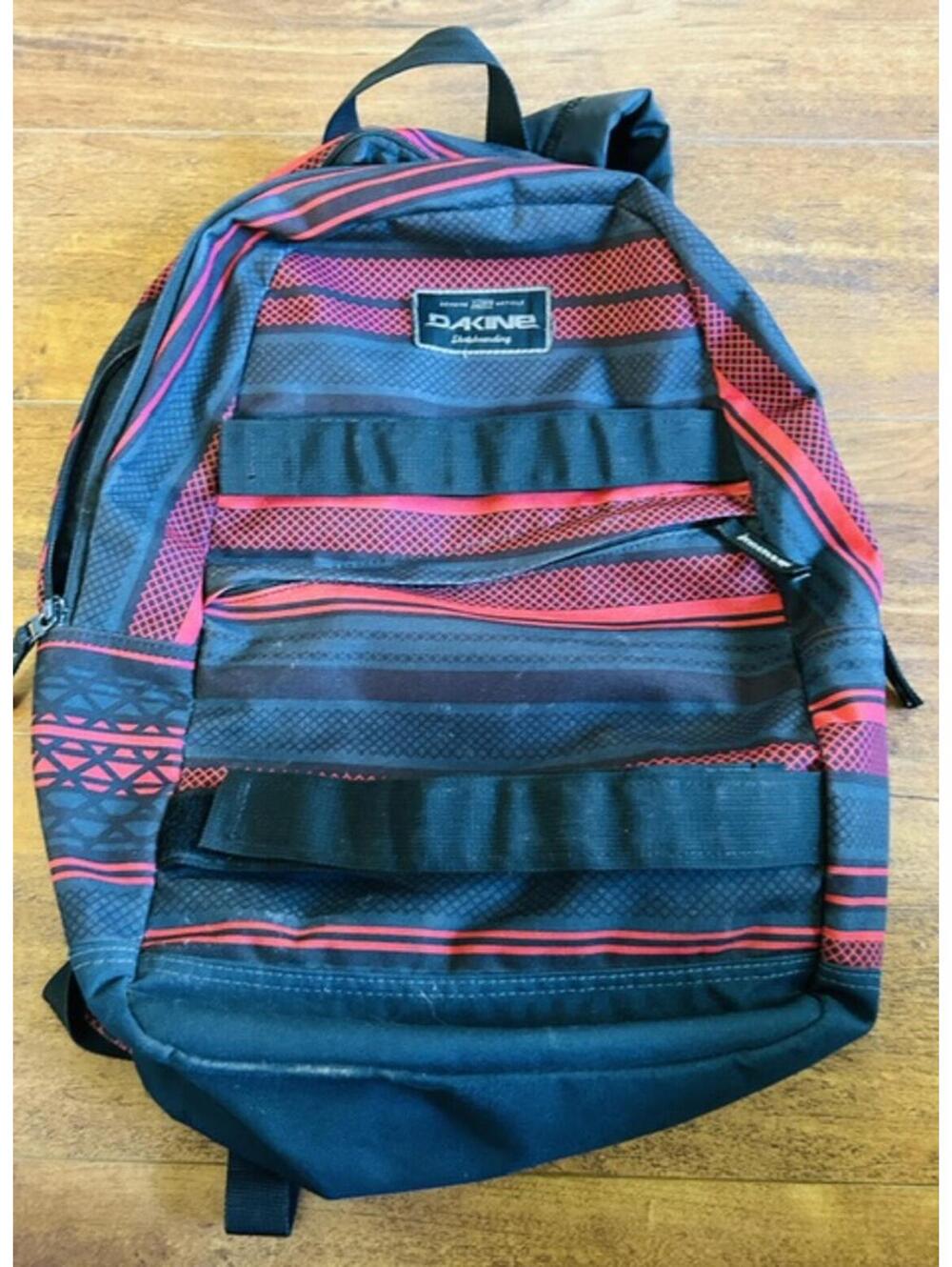Dakine Skateboarding Backpack with Red and Black Stripes